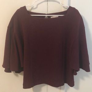 Sophisticated maroon batwing shirt